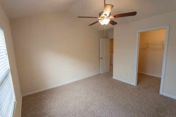 This is a photo of the second bedroom in the 1578 square foot, 3 bedroom, 2 and 1/2 bath Flagship floor plan at Nantucket Apartments in Loveland, OH.