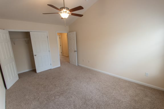 This is a photo of the second bedroom in the 1578 square foot, 3 bedroom, 2 and 1/2 bath Flagship floor plan at Nantucket Apartments in Loveland, OH.