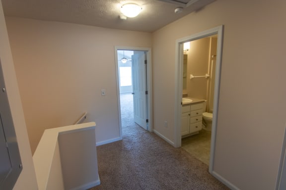 This is a photo of the second floor hallway in the 1578 square foot, 3 bedroom, 2 and 1/2 bath Flagship floor plan at Nantucket Apartments in Loveland, OH.