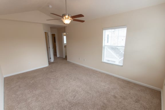 This is a photo of the primary bedroom in the 1578 square foot, 3 bedroom, 2 and 1/2 bath Flagship floor plan at Nantucket Apartments in Loveland, OH.