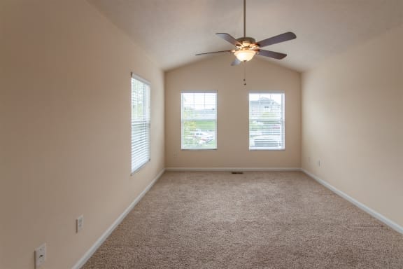 This is a photo of the primary bedroom in the 1578 square foot, 3 bedroom, 2 and 1/2 bath Flagship floor plan at Nantucket Apartments in Loveland, OH.