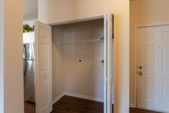 This is a photo of the utility closet with washer/dryer hookups in the 2 bedroom, 2 bath Islander floor plan at Nantucket Apartments in Loveland, OH.