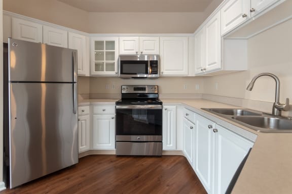 This is a photo of the kitchen in the 1255 square foot, 2 bedroom, 2 bath LIghthouse floor plan at Nantucket Apartments in Loveland, OH.