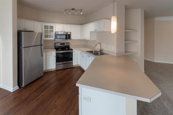 This is a photo of the kitchen in the 1255 square foot, 2 bedroom, 2 bath LIghthouse floor plan at Nantucket Apartments in Loveland, OH.