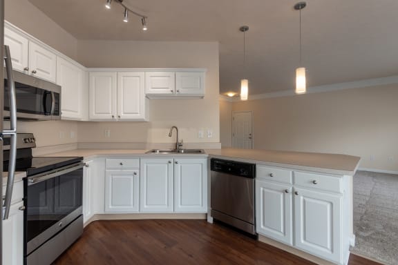 This is a photo of the kitchen in the 1255 square foot, 2 bedroom, 2 bath LIghthouse floor plan at Nantucket Apartments in Loveland, OH.