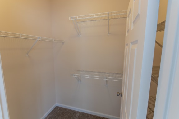 This is a photo of the second bedroom walk-in closet in the 1255 square foot, 2 bedroom, 2 bath LIghthouse floor plan at Nantucket Apartments in Loveland, OH.