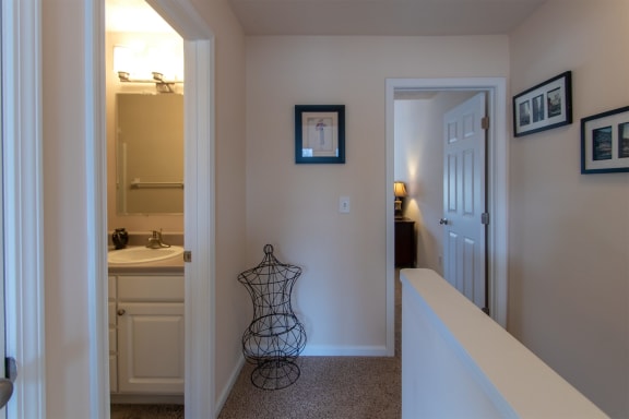 This is a photo of the second floor hallway in the 1242 square foot, 2 bedroom, 2 and 1/2 bath Spinnaker floor plan at Nantucket Apartments in Loveland, OH.