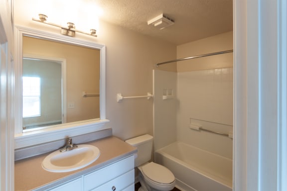 This is a photo of the primary bathroom in the 1016 square foot, 2 bedroom, 2 bath Nautica floor plan with vaulted ceilings at Nantucket Apartments in Loveland, OH.