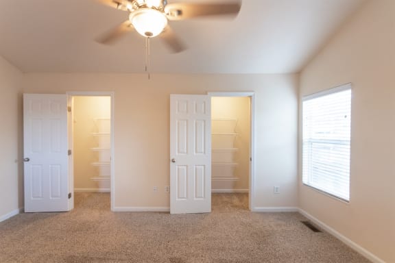 This is a photo of the primary bedroom in the 1498 square foot, 2 bedroom, 2 and 1/2 bath Schooner floor plan at Nantucket Apartments in Loveland, OH.