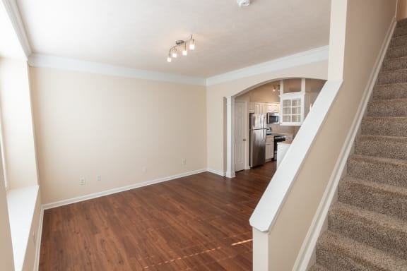 This is a photo of the dining room in the 1498 square foot, 2 bedroom, 2 and 1/2 bath Schooner floor plan at Nantucket Apartments in Loveland, OH.