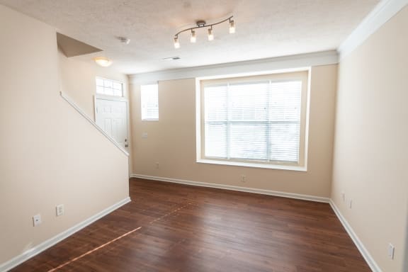 This is a photo of the dining room in the 1498 square foot, 2 bedroom, 2 and 1/2 bath Schooner floor plan at Nantucket Apartments in Loveland, OH.