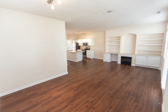 This is a photo of the living room in the 1498 square foot, 2 bedroom, 2 and 1/2 bath Schooner floor plan at Nantucket Apartments in Loveland, OH.