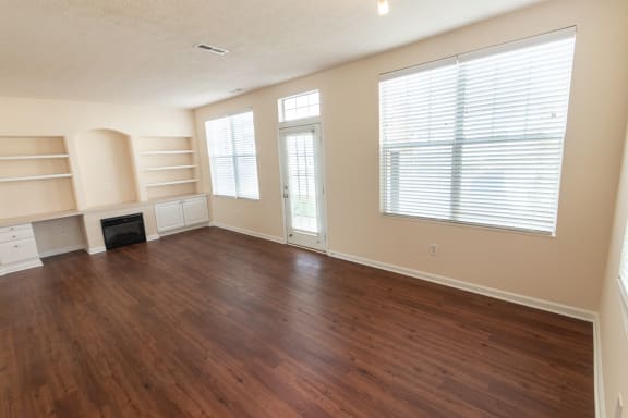 This is a photo of the living room in the 1498 square foot, 2 bedroom, 2 and 1/2 bath Schooner floor plan at Nantucket Apartments in Loveland, OH.