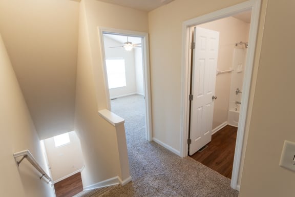 This is a photo of the second floor hallway in the 1498 square foot, 2 bedroom, 2 and 1/2 bath Schooner floor plan at Nantucket Apartments in Loveland, OH.