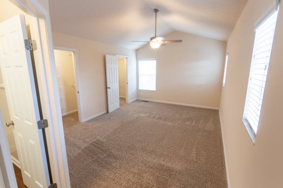 This is a photo of the primary bedroom in the 1498 square foot, 2 bedroom, 2 and 1/2 bath Schooner floor plan at Nantucket Apartments in Loveland, OH.