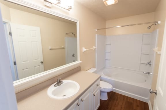 This is a photo of the primary bathroom in the 1498 square foot, 2 bedroom, 2 and 1/2 bath Schooner floor plan at Nantucket Apartments in Loveland, OH.