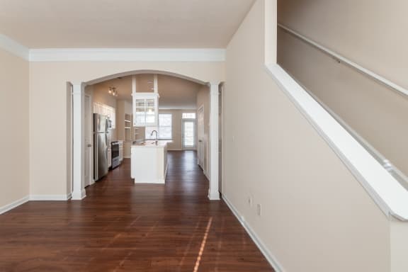 This is a photo of the dining room in the 1498 square foot, 2 bedroom, 2 and a half bath Schooner floor plan at Nantucket Apartments in Loveland, OH.