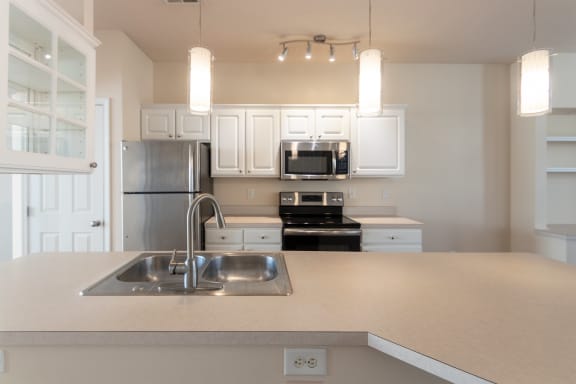 This is a photo of the kitchen in the 1498 square foot, 2 bedroom, 2 and a half bath Schooner floor plan at Nantucket Apartments in Loveland, OH.