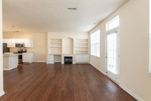 This is a photo of the living room in the 1498 square foot, 2 bedroom, 2 and a half bath Schooner floor plan at Nantucket Apartments in Loveland, OH.