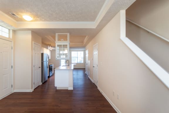 This is a photo of the dining room in the 1389 square foot, 2 bedroom, 2 and a 1/2 bath Yachtsman floor plan at Nantucket Apartments in Loveland, OH.
