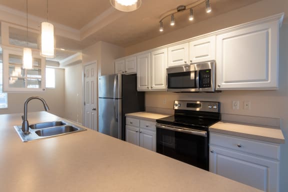 This is a photo of the kitchen in the 1389 square foot, 2 bedroom, 2 and a 1/2 bath Yachtsman floor plan at Nantucket Apartments in Loveland, OH.