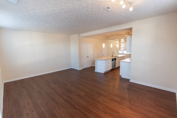 This is a photo of the living room in the 1389 square foot, 2 bedroom, 2 and a 1/2 bath Yachtsman floor plan at Nantucket Apartments in Loveland, OH.