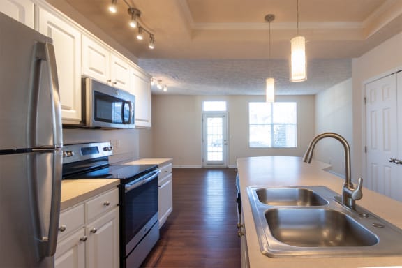 This is a photo of the kitchen in the 1389 square foot, 2 bedroom, 2 and a 1/2 bath Yachtsman floor plan at Nantucket Apartments in Loveland, OH.