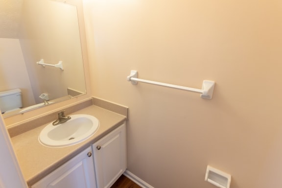 This is a photo of the half bath in the 1389 square foot, 2 bedroom, 2 and a 1/2 bath Yachtsman floor plan at Nantucket Apartments in Loveland, OH.