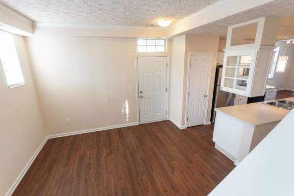 This is a photo of the dining room in the 1389 square foot, 2 bedroom, 2 and a 1/2 bath Yachtsman floor plan at Nantucket Apartments in Loveland, OH.