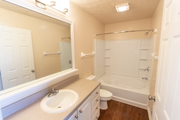 This is a photo of the primary bedroom in the 1389 square foot, 2 bedroom, 2 and a 1/2 bath Yachtsman floor plan at Nantucket Apartments in Loveland, OH.
