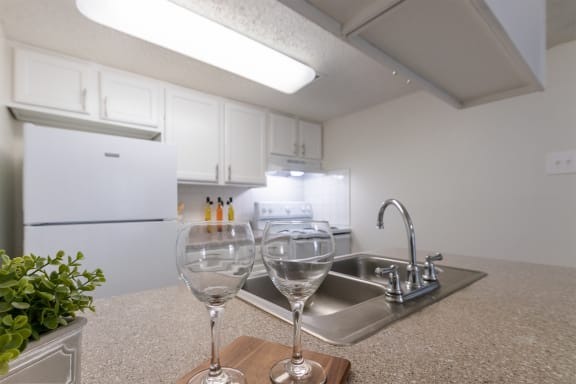 Kitchen With Modern Lighting at Princeton Court, Dallas, TX