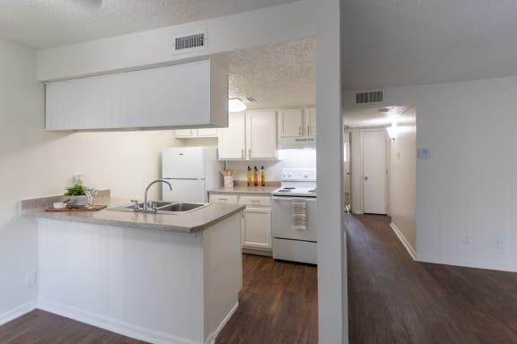 Kitchen And Hallway at Princeton Court, Dallas
