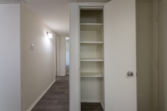 This is a photo of the entryway closet in the 970 square foot 2 bedroom, 2 bath apartment at Preston Park Apartments in Dallas, TX
