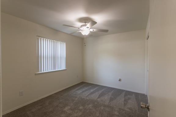 This is a photo of the second bedroom in the 970 square foot 2 bedroom, 2 bath apartment at Preston Park Apartments in Dallas, TX