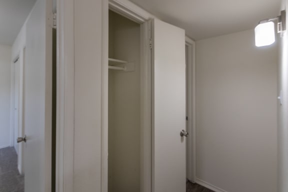 This is a photo of the hall closet in the 970 square foot 2 bedroom, 2 bath apartment at Preston Park Apartments in Dallas, TX
