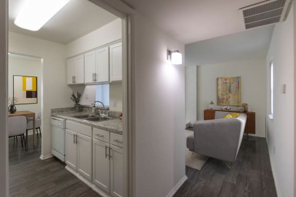 This is a photo of a virtually staged entryway in the 970 square foot 2 bedroom, 2 bath apartment at Preston Park Apartments in Dallas, TX