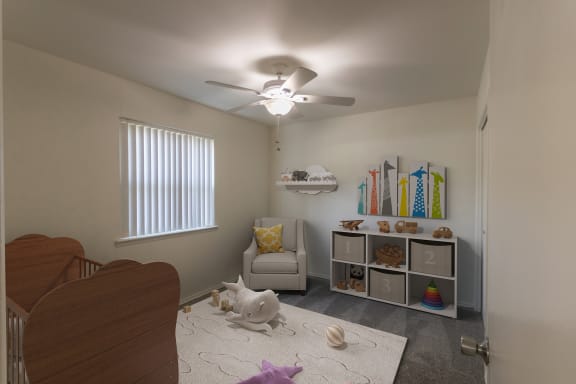 This is a photo of a virtually staged second bedroom room in the 970 square foot 2 bedroom, 2 bath apartment at Preston Park Apartments in Dallas, TX