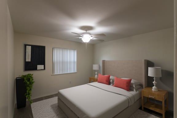 This is a photo of a virtually staged primary bedroom room in the 970 square foot 2 bedroom, 2 bath apartment at Preston Park Apartments in Dallas, TX