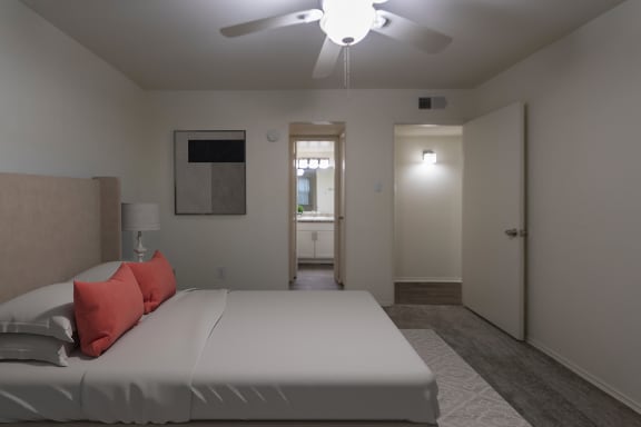 This is a photo of a virtually staged primary bedroom room in the 970 square foot 2 bedroom, 2 bath apartment at Preston Park Apartments in Dallas, TX