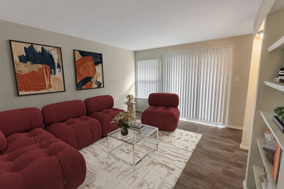 This is a photo of a virtually staged living room in the 650 square foot 1 bedroom, 1 bath apartment at Preston Park Apartments in Dallas, TX.