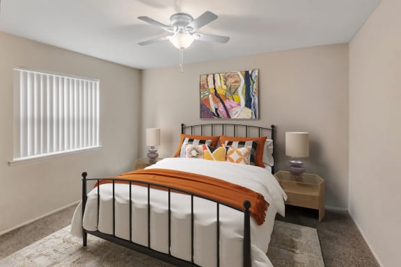 This is a photo of a virtually staged bedroom in the 650 square foot 1 bedroom, 1 bath apartment at Preston Park Apartments in Dallas, TX.