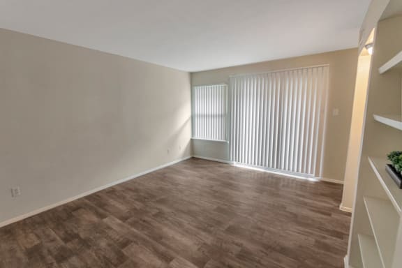 This is a photo of the living room in the 650 square foot 1 bedroom, 1 bath apartment at Preston Park Apartments in Dallas, TX