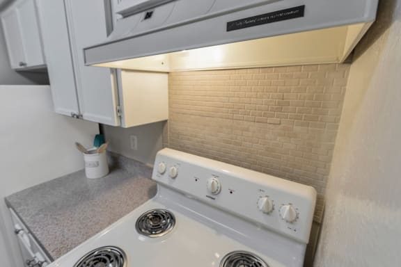 This is a photo of the kitchen in the 650 square foot 1 bedroom, 1 bath apartment at Preston Park Apartments in Dallas, TX
