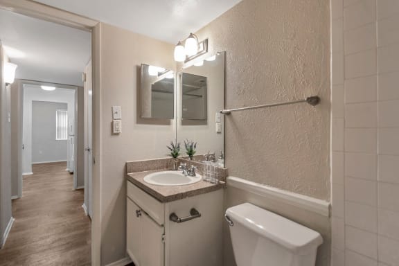 This is a photo of the bathroom in the 650 square foot 1 bedroom, 1 bath apartment at Preston Park Apartments in Dallas, TX
