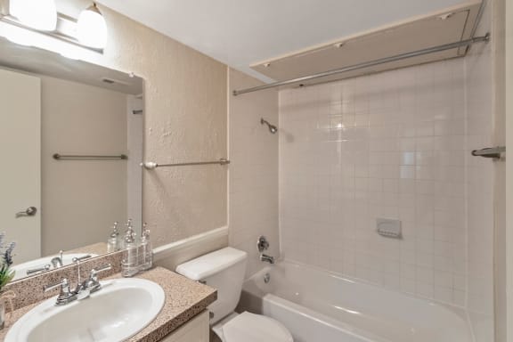 This is a photo of the bathroom in the 650 square foot 1 bedroom, 1 bath apartment at Preston Park Apartments in Dallas, TX