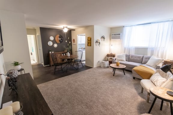 This is a picture of the living room and dining area in a 576 sq foot 1 bedroom, 1 bath apartment at Red Bank Reserve in the Madisonville neighborhood of Cincinnati, Ohio.