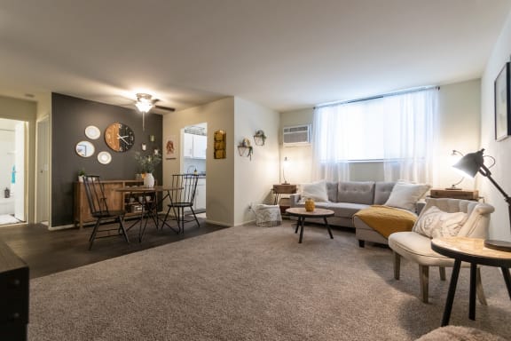 This is a picture of the living room and dining area in a 576 sq foot 1 bedroom, 1 bath apartment at Red Bank Reserve in the Madisonville neighborhood of Cincinnati, Ohio.