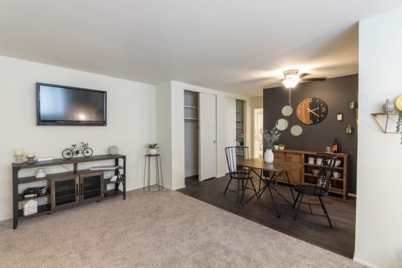 This is a picture of the living room and dining area in a 576 sq foot 1 bedroom, 1 bath apartment at Red Bank Reserve in the Madisonville neighborhood of Cincinnati, Ohio.