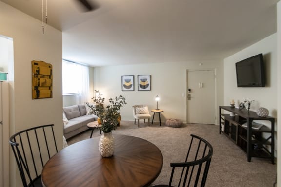 This is a picture of the living room from the dining area in a 576 sq foot 1 bedroom, 1 bath apartment at Red Bank Reserve in the Madisonville neighborhood of Cincinnati, Ohio.
