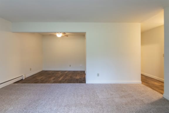 This is a picture of the living room and dining area in a 748 sq foot 2 bedroom, 1 bath apartment at Red Bank Reserve in the Madisonville neighborhood of Cincinnati, Ohio.